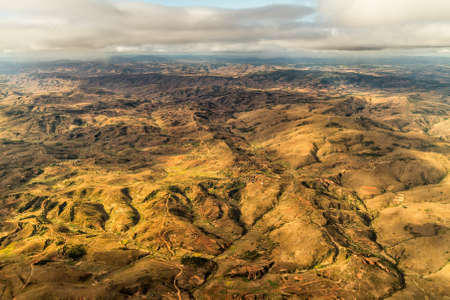 Aerial view of the of the mountainous terrain of the highland areas of Madagascarの写真素材
