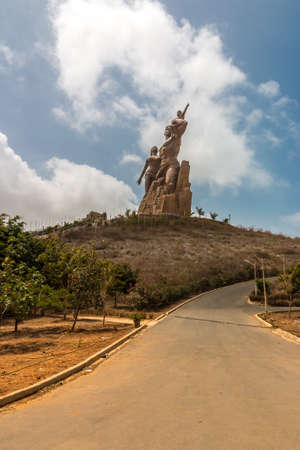 African Renaissance Monument, a 49 meter tall bronze statue of a man, woman and child, in Dakar, Senegalのeditorial素材