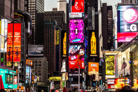 New York - Sept 2014: The glamorous streets of Times Square New York with thousands of tourists and...