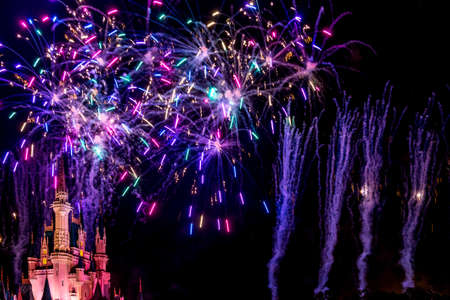 Orlando, Florida - Sept 4: The famous Wishes nighttime spectacular fireworks light up the sky at the Disney Magic Kingdom Castle in Orlando, Florida, on September 4, 2014のeditorial素材