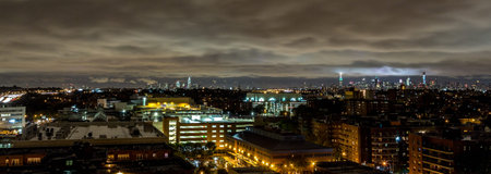 The view of Manhattan skyline at night from Queens, New Yorkの写真素材