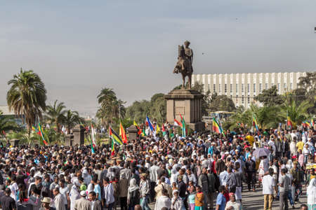 Addis Ababa - Sept 2: A large crowd gathers in front of Emperor Menelikâs Monument to celebrate the 119th Anniversary of the Ethiopian Armyâs victory over the invading Italian forces in the 1896 battle of Adwa. September 2, 2015, Addis Ababa, Ethiopiaのeditorial素材