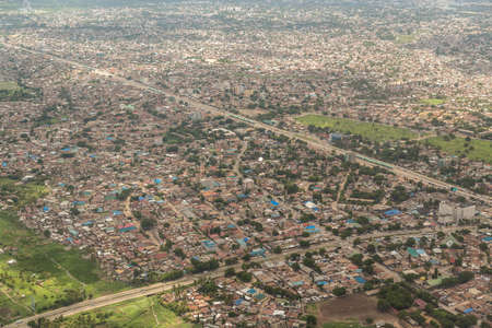 Aerial view of the city of Dar Es Salaam  showing the densely packed houses and  buildingsの写真素材