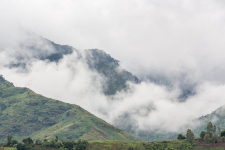 Moving clouds covering the Uluguru Mountains in the city of Morogoro, Eastern Region of Tanzania,...