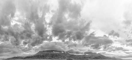 Moving clouds covering the Uluguru Mountains in the city of Morogoro, Eastern Region of Tanzania, Africa.の写真素材