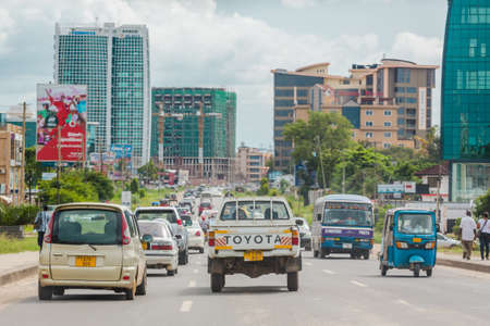 Dar Es Salaam: April 22: Traffic slows down travellers on the busy streets of Downtown Dar Es Salaam on April 22, 2015 in Dar Es Salaam, Tanzaniaのeditorial素材