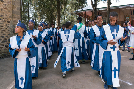 ADDIS ABABA, ETHIOPIA - May 21: A young member of the Ethiopian Orthodox Church Choir sing and chant...