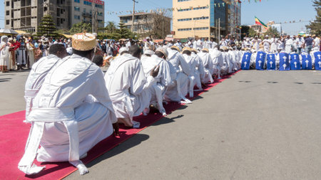 Addis Ababa - Jan 19: Ethiopian Orthodox Clergy and followers sing and chant while accompanying the Tabot, a model of the arc of covenant, during a colorful procession which is part of Timket celebrations of Epiphany, on January 19, 2017 in Addis Ababa, Eのeditorial素材