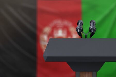 Afghanistan flag with microphones and a podiumの写真素材