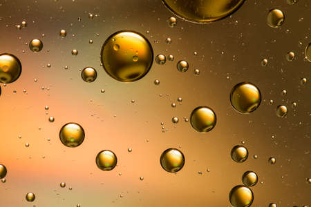 Orange and gold oil and water abstract