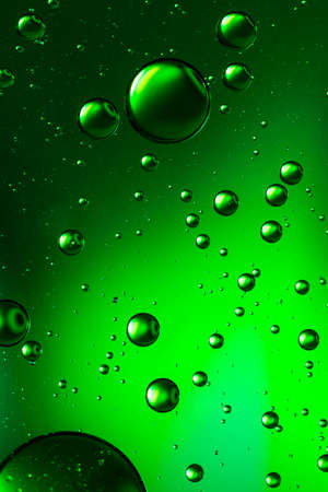 Green oil and water abstractの写真素材