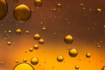 Orange and brown oil and water abstractの写真素材