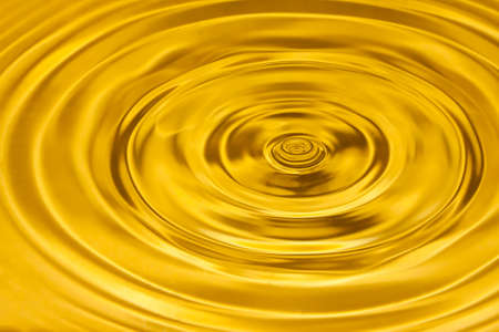 Gold water ripple abstract backgroundの写真素材