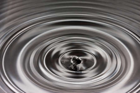 Black and silver water ripple abstract backgroundの写真素材