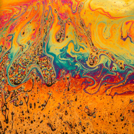 Psychedelic patterns formed on the surface of soap bubblesの写真素材