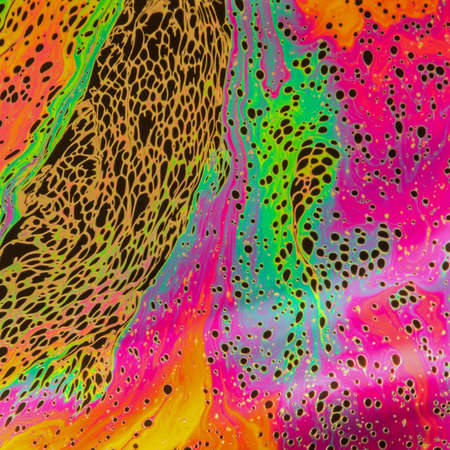 Psychedelic background blur made from soap bubbleの写真素材