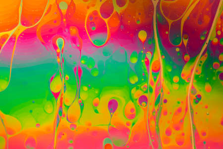 Psychedelic abstract formed by light reflecting off soap bubbleの写真素材
