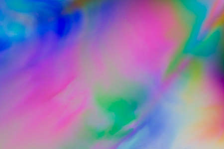 Colorful psychedelic blur showing stress distribution in plastic using polarized lightの写真素材