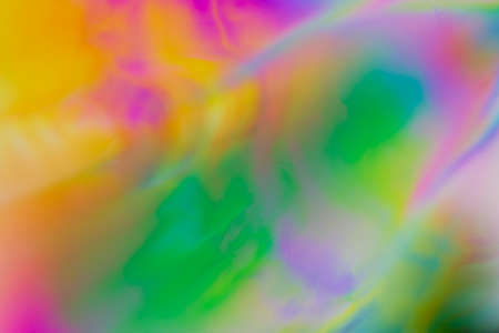 Colorful psychedelic blur showing stress distribution in plastic using polarized lightの写真素材