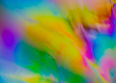 Colorful psychedelic blur showing stress distribution in plastic using polarized lightの写真素材