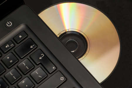 Selective focus cd or dvd in laptop driveの写真素材