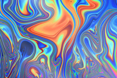 Psychedelic abstract formed by soap bubble reflecting lightの写真素材