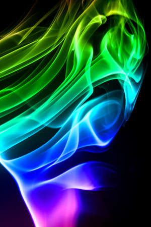 Colored smoke isolated on a black backgroundの写真素材