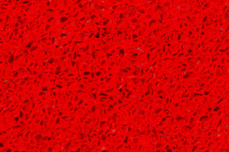 Red polished artificial stone agglomerateの写真素材