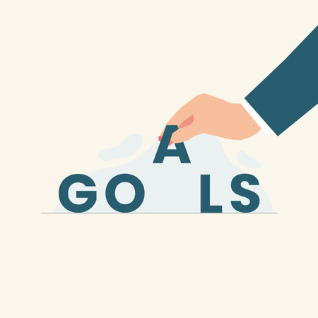 Hand takes the letter A from the word GOALS vector illustrationのイラスト素材