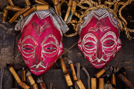 African wooden masks on the market. Souvenirs of Namibia.の写真素材