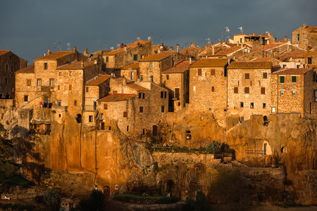 Medieval town of Pitigliano in Tuscany, Italy at sunset - architecture backgroundの写真素材
