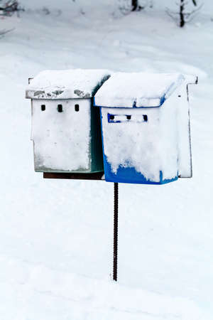 Mailboxes by the road in the snow. Finlandの写真素材