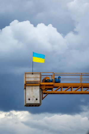 Ukrainian flag on a background of sky with clouds.の写真素材
