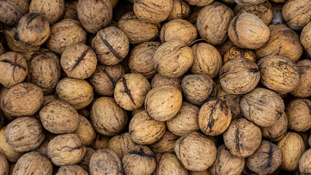 Walnuts with shells. background of walnuts.