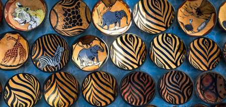 African wooden plates on the market. Souvenirs of Namibia.