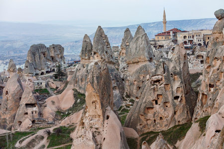 View of the city of Ortahisar, old houses in the rocks, a mosque. cappadocia. province of Nevsehir. Turkeyのeditorial素材