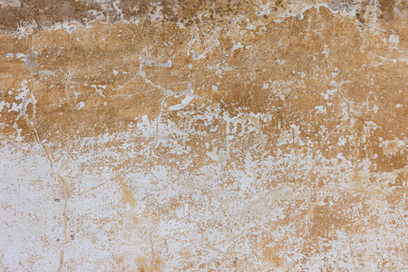 A brown textured wall with a rough texture.の写真素材