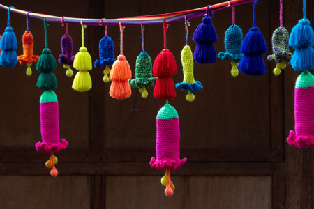 Peruvian decor. Colorful knitted decor - bellsの写真素材