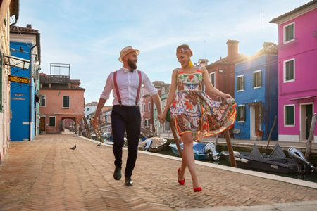 Romantic couple in Burano at dawn, Italy. Soft focusの写真素材