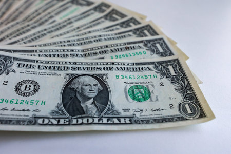 One dollar bills on white background