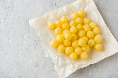 Cheese corn balls. Snack on the table.