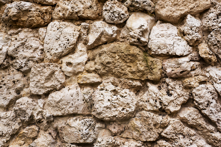 Texture of old gray stone Background the ruins of the building.の写真素材