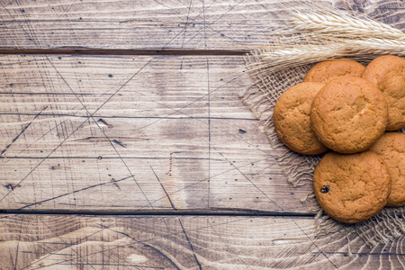 Natural oatmeal cookies on wooden background. Rustic style Copy spaceの写真素材