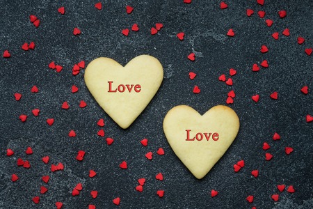 Heart shaped cookies for valentine's day on dark backgroundの写真素材