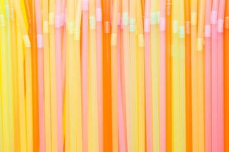 Abstract a colorful of plastic straws used for drinking water or soft drinks. Selective focus. Copy space.の写真素材