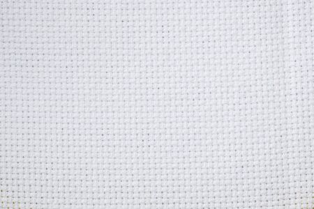 White background texture canvas for cross stit.の写真素材