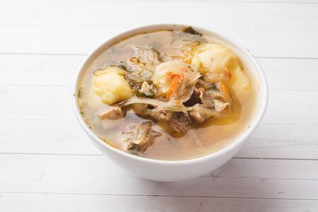 Soup of sauerkraut, meat stock in the dishの写真素材