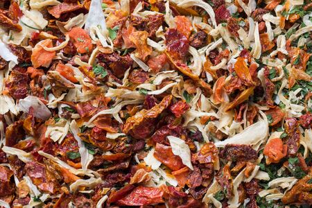 Dried spices, sun-dried tomatoes, dried carrots, Basil and Provencal herbs.の写真素材