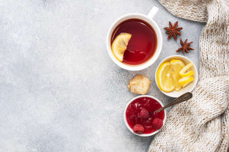 Lemon raspberry jam hot tea. Warming products for the prevention of colds and flu. Copy spaceの写真素材