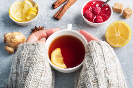 Lemon raspberry jam hot tea. Warming products for the prevention of colds and flu. Copy space